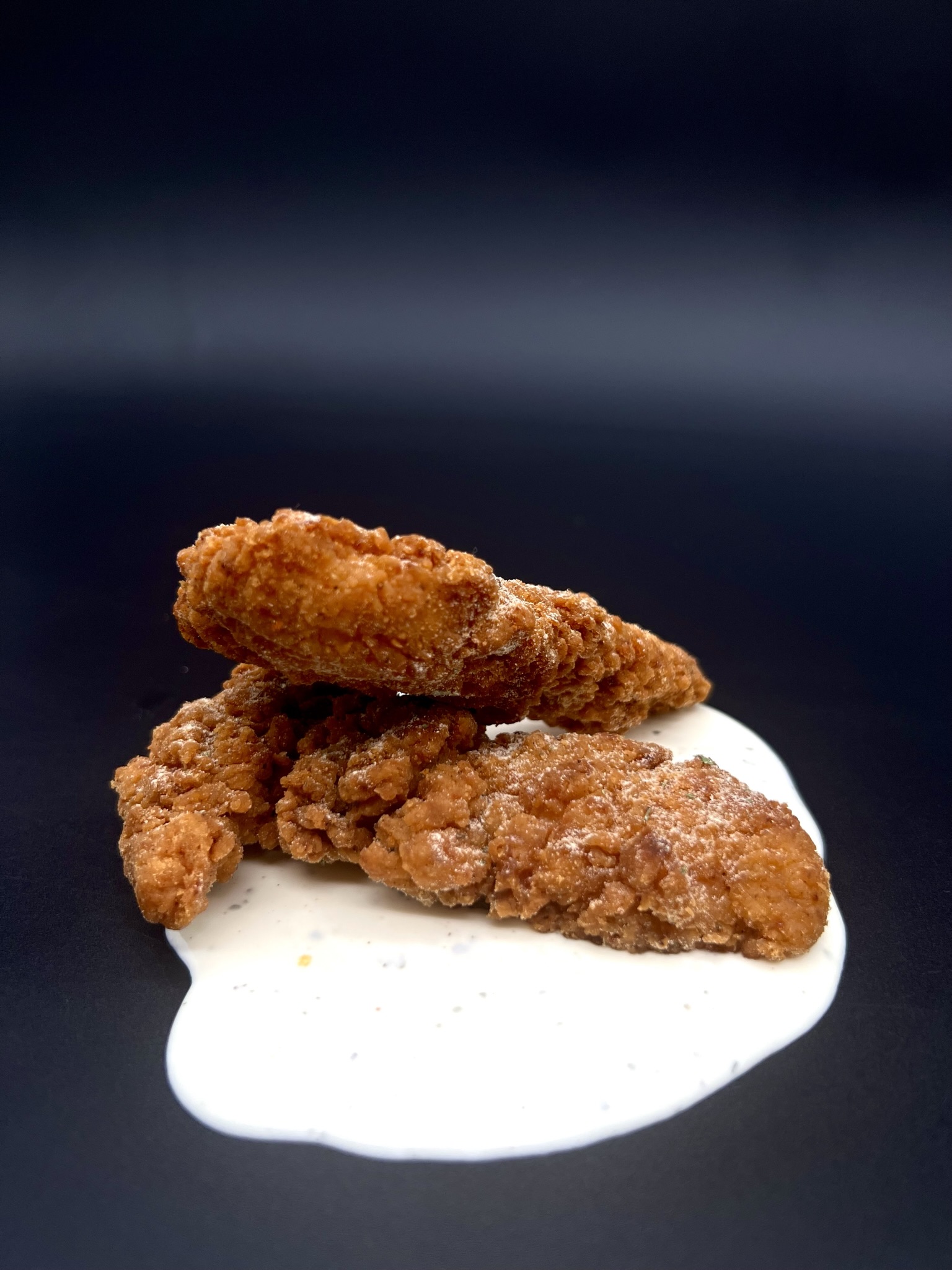 Crispy golden chicken tenders in a bowl