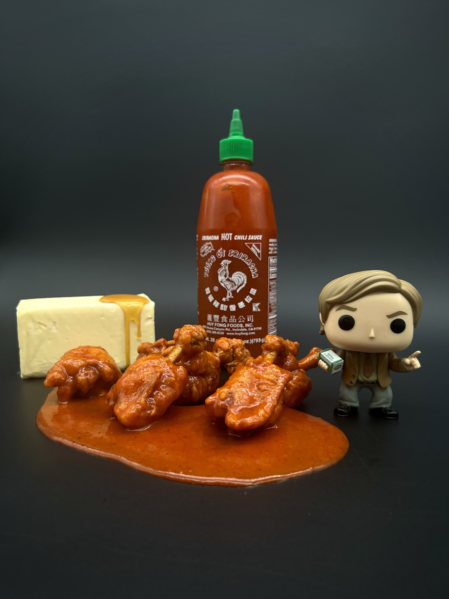 A plate of expertly frenched chicken lollipops